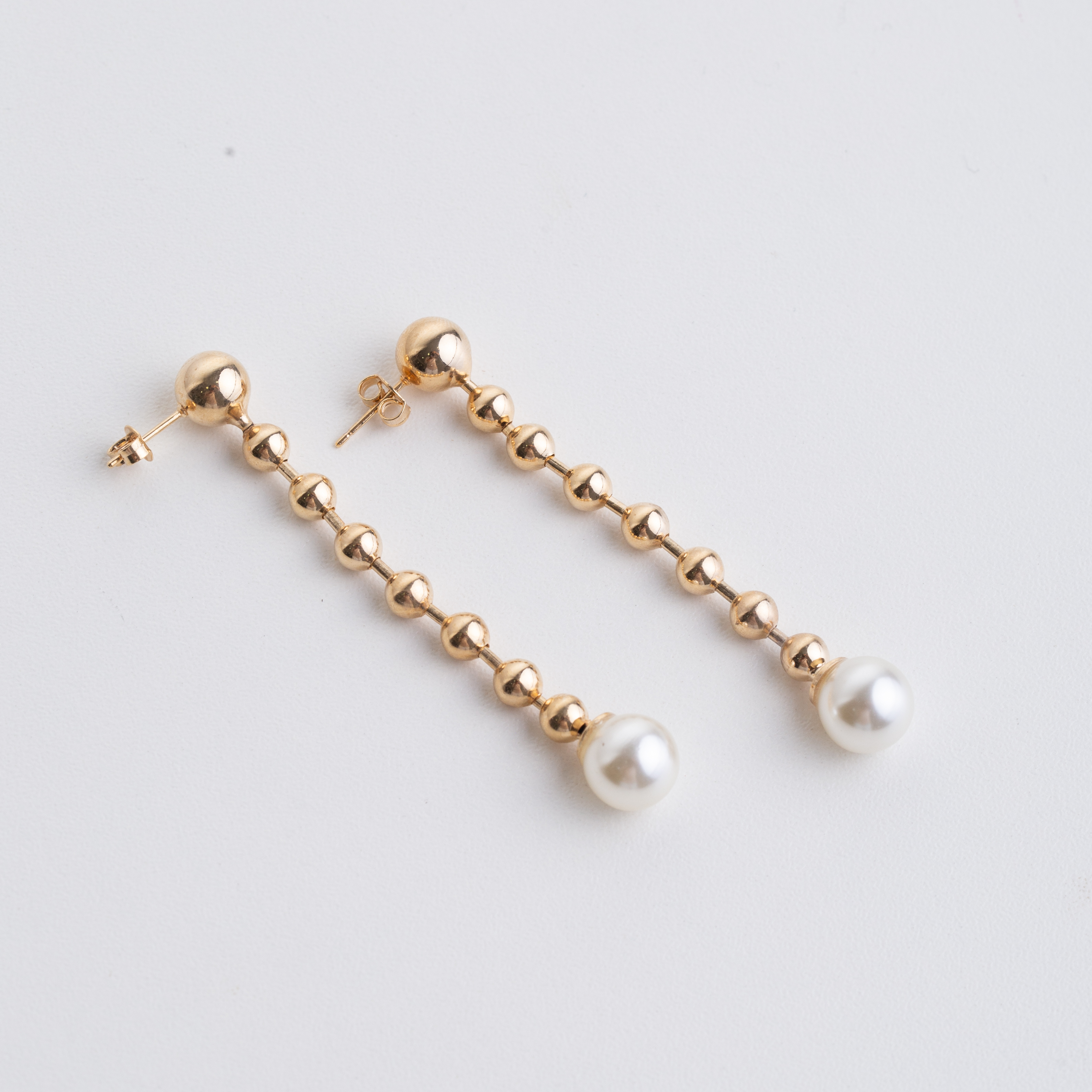 22028 Gold Long Drop Earrings with Pearl and Polished Beads
